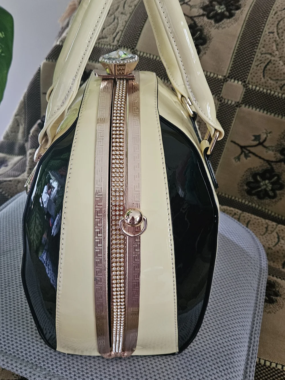 Elegant Patent Handbag With Crystal Clasp